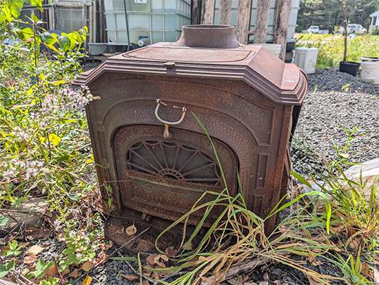old wood stove rusted